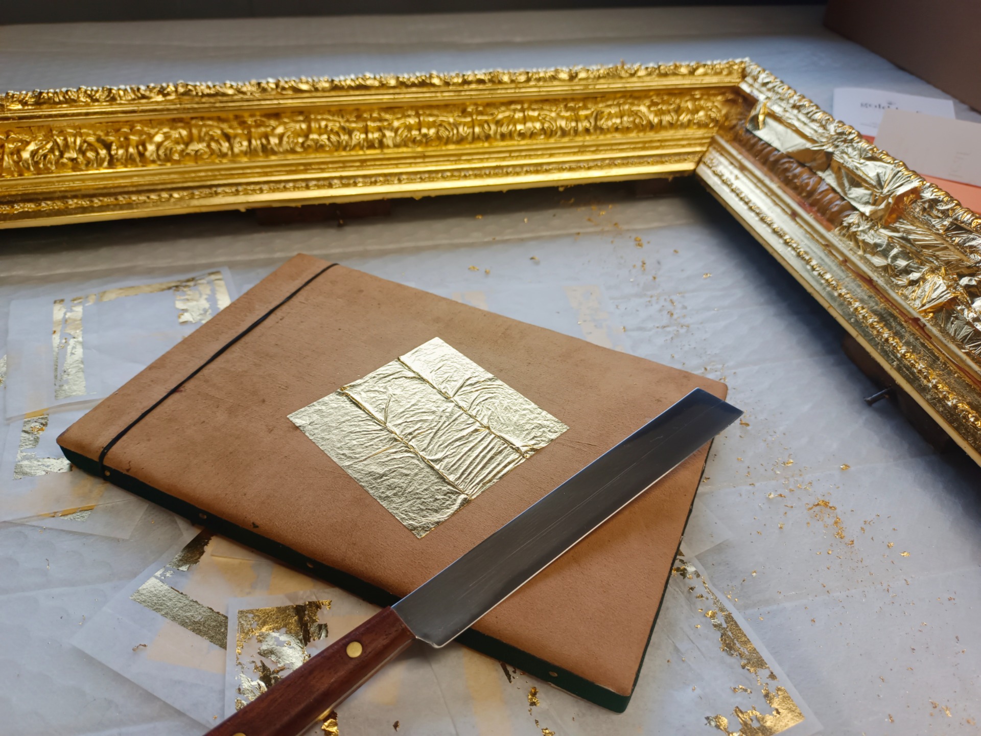 23.5ct gold leaf on a gilding pad