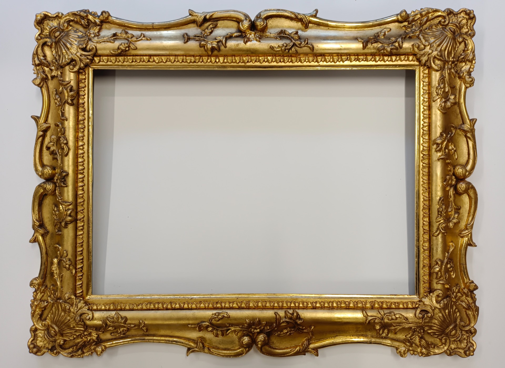 Freshly re-gilded and aged frame